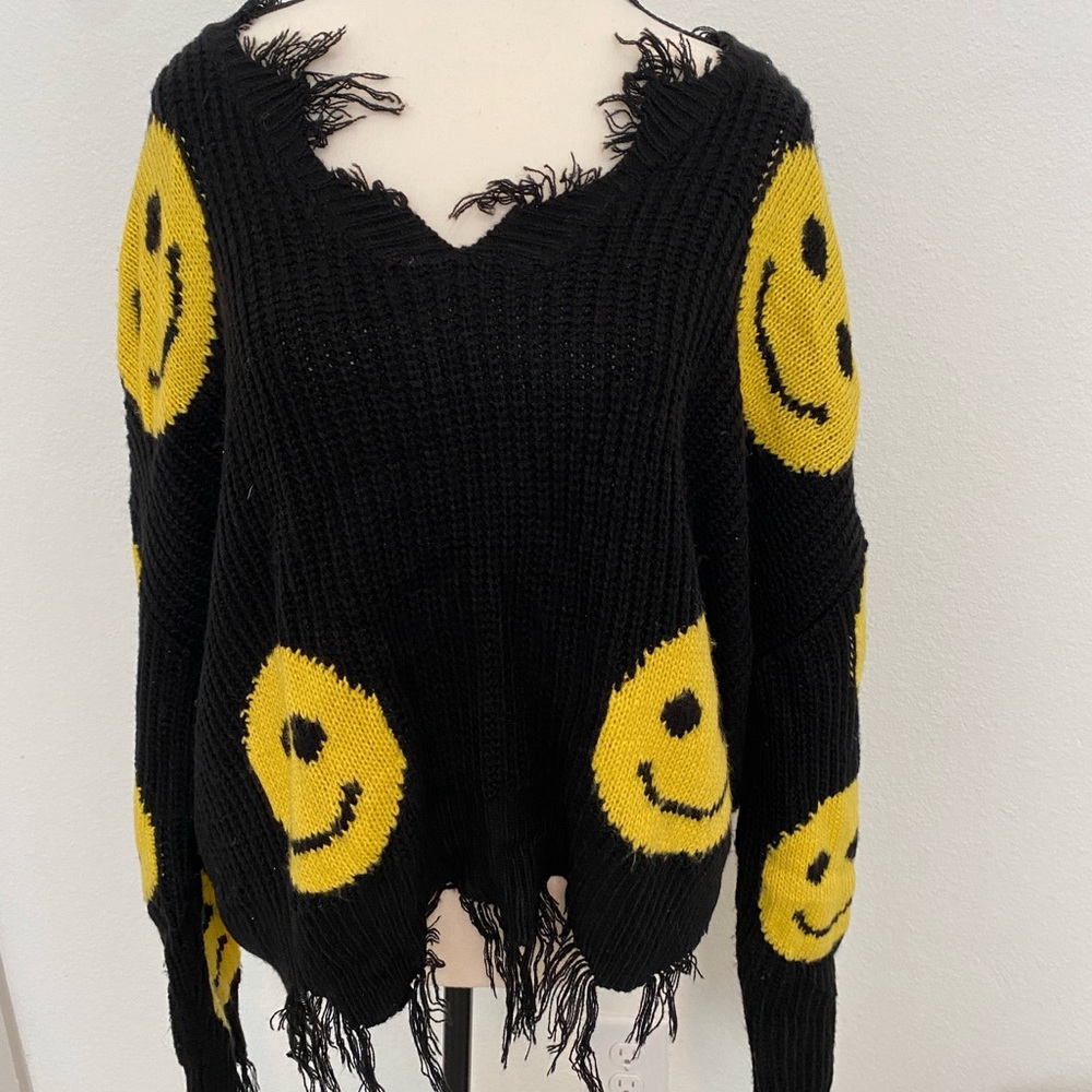 Off the shoulder black frayed sweater